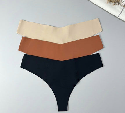 Three pairs of underwear in beige, brown, and black on a light gray background.