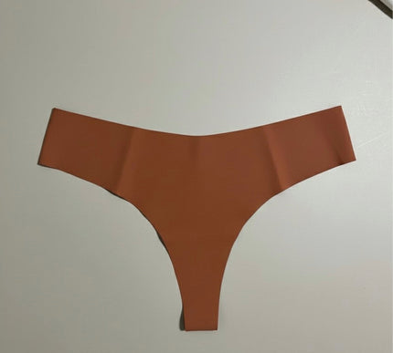 Brown thong on a light gray background